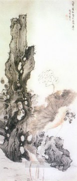 中国の伝統芸術 Painting - 蘭英の花と岩の繁体字中国語